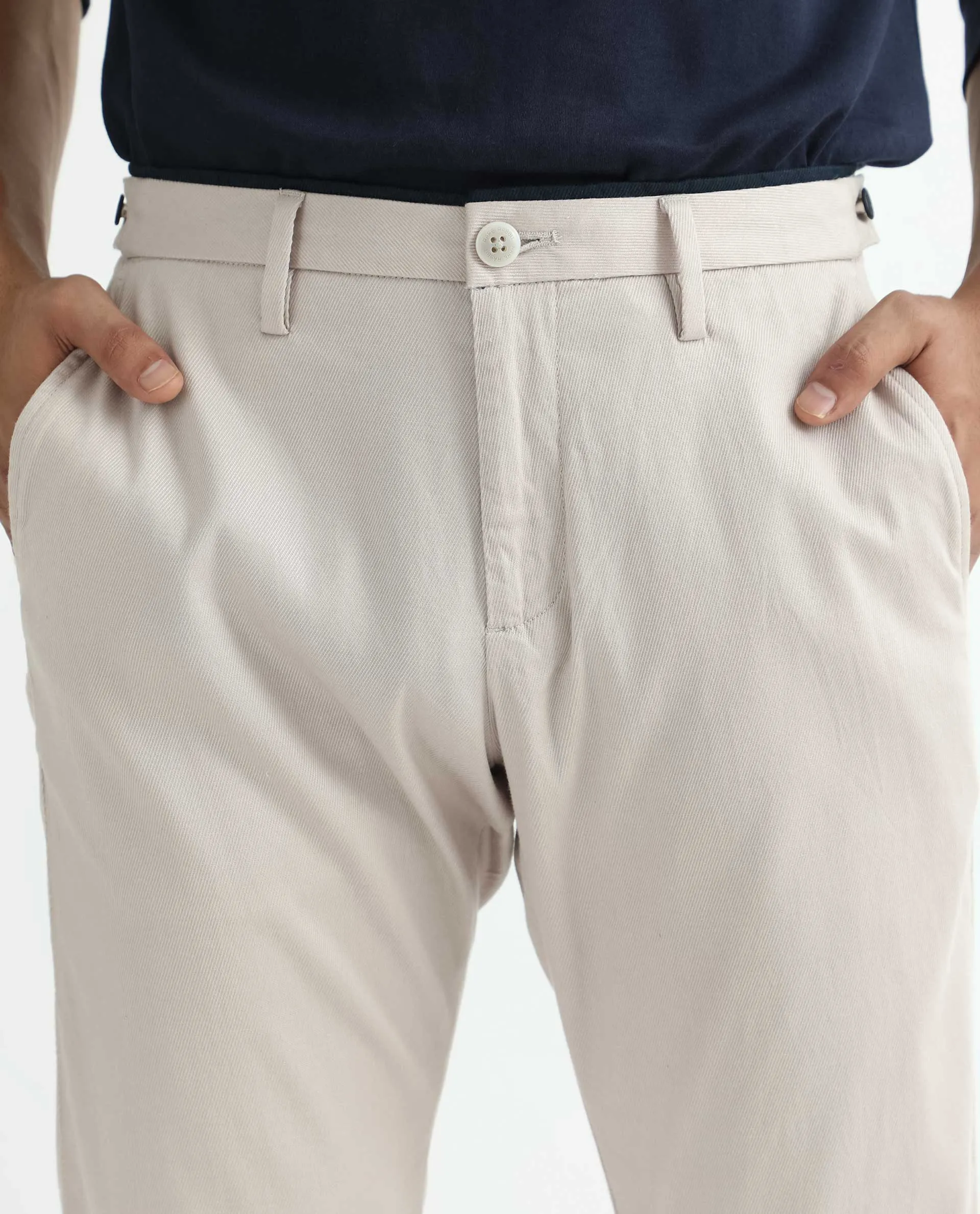 Rare Rabbit Men's Cellular Light Pink Solid Mid-Rise Regular Fit Twill Trouser